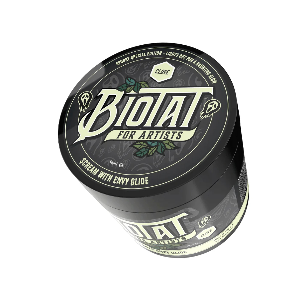 Biotat Scream With Envy 500g glide in glow-in-dark limited edition jar — green tattoo glide product for numbing and reducing redness during tattooing.